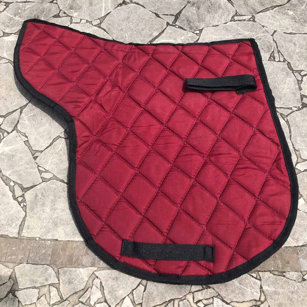 Shaped saddle pad